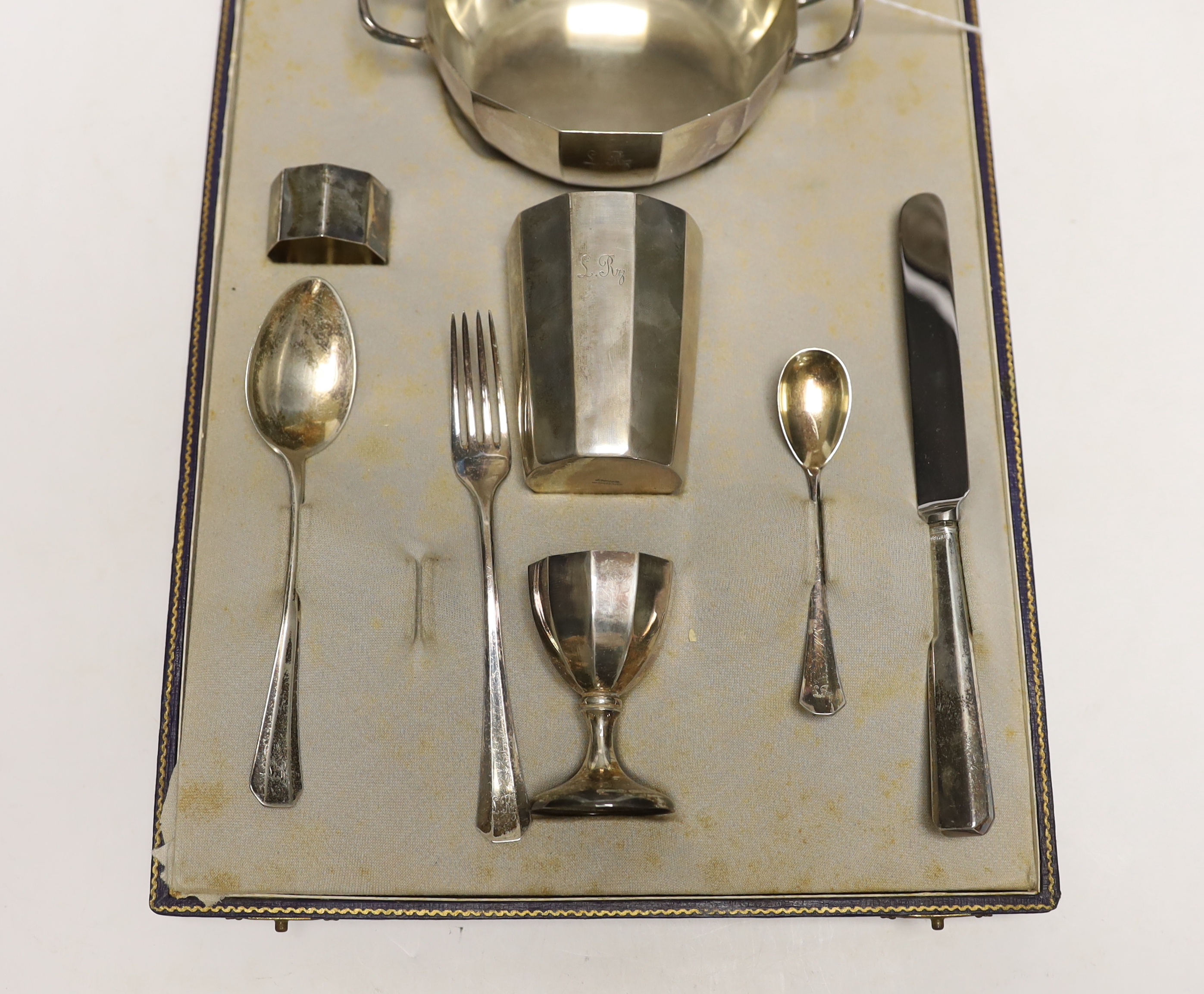 A cased matched 800 standard German eight piece breakfast set, gross weight 9.5oz.